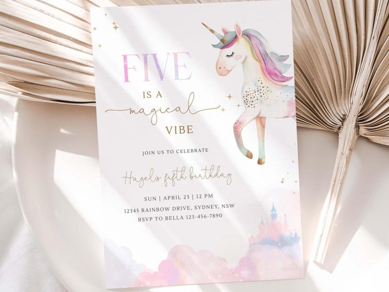 May include: A whimsical birthday invitation with a watercolor unicorn illustration. The text reads "FIVE is a magical VIBE" in a playful font. The invitation includes details for Hazel's fifth birthday.