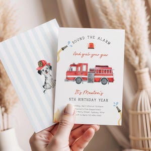 May include: Two invitation cards. One card features a Dalmatian puppy wearing a firefighter hat. The other card has a red fire truck illustration with the text "SOUND THE ALARM And grab your gear. It's Maxton's 5TH BIRTHDAY YEAR."