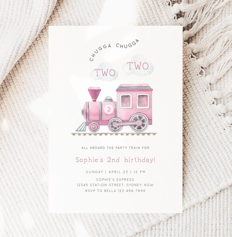May include: Pink watercolor train with the words "Chugga Chugga Two Two" above it. The train has a number "2" on the side. The text below the train says "All aboard the party train for Sophie's 2nd birthday! Sunday | April 23 | 12 PM Sophie's Express 12345 Station Street, Sydney, NSW RSVP to Bella 123-456-7890"