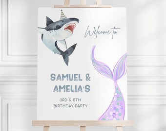 May include: Welcome to Samuel & Amelia's 3rd & 5th Birthday Party sign with a blue and white shark and a purple mermaid tail.