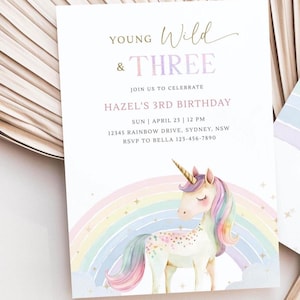 May include: A pastel rainbow with a unicorn standing on a cloud. The invitation reads "Young Wild & Three" and "Hazel's 3rd Birthday". The date and time of the party are listed as "Sun | April 23 | 12 PM". The address is "12345 Rainbow Drive, Sydney, NSW". The RSVP information is "RSVP to Bella 123-456-7890".