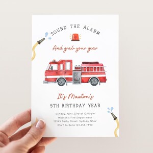 May include: A white invitation card with a watercolor illustration of a red fire truck. The text reads "SOUND THE ALARM" and "And grab your gear". It's a birthday invitation for a 5th birthday, with event details.