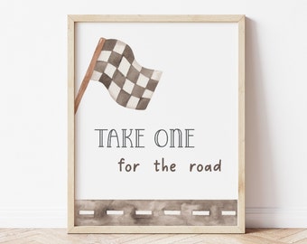 May include: A framed print with a watercolor illustration of a checkered racing flag and the text "TAKE ONE for the road". A brown road is depicted at the bottom of the print.