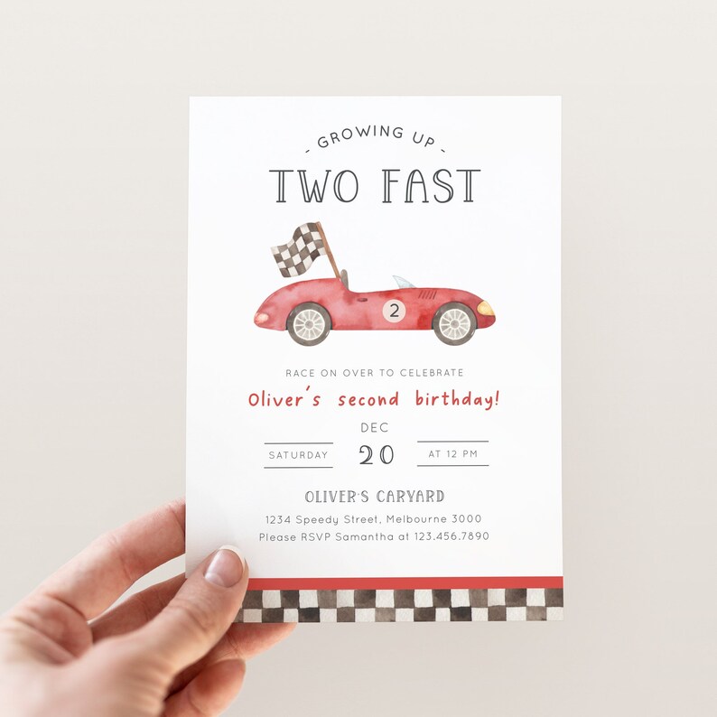 May include: Red and white birthday party invitation with a cartoon red race car with a checkered flag. The text reads "Growing Up. Two Fast. Race on over to celebrate Oliver's second birthday! Saturday, December 20 at 12 PM. Oliver's Caryard. 1234 Speedy Street, Melbourne 3000. Please RSVP Samantha at 123.456.7890"
