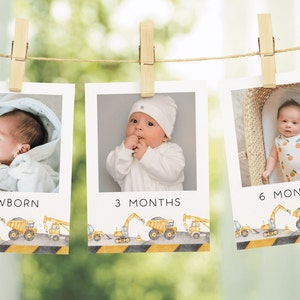 May include: Three photos of a baby at different ages, newborn, 3 months, and 6 months. Each photo is hung with a clothespin on a string. The photos are decorated with a construction theme, featuring yellow construction vehicles and black and yellow hazard tape.