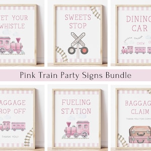 May include: Pink train party signs bundle with illustrations of trains and text such as "Wet Your Whistle", "Sweets Stop", "Dining Car", "Baggage Drop Off", "Fueling Station", and "Baggage Claim".