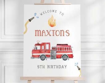 May include: Welcome to Maxton's 5th Birthday party sign featuring a red fire engine, yellow hose, and a flame illustration.