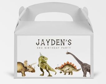 May include: White favor box with a label featuring a dinosaur theme. The label says "Jayden's 3rd Birthday Party" and features illustrations of four dinosaurs wearing party hats.