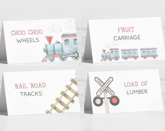 May include: Four printable cards with a train theme. The cards feature a blue train with red wheels, a train crossing sign, a set of train tracks, and a train with three cars. The text on the cards reads "Choo Choo Wheels", "Fruit Carriage", "Rail Road Tracks", and "Load of Lumber".