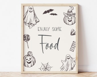 May include: A white printable sign with black ink drawings of ghosts, pumpkins, bats, and candy. The text on the sign reads "Enjoy some Food".