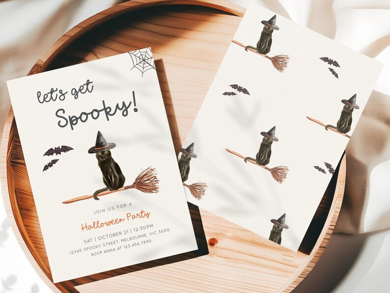 May include: Halloween party invitations featuring a black cat wearing a witch hat and riding a broom. The invitations have the text "Let's get Spooky!" and party details. The design includes bats and a spider web.