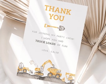 May include: A thank you card with a yellow shovel and construction vehicles. The card says "Thank You" and "For joining my party crew! I hope you had truck loads of fun! Love, Caleb".