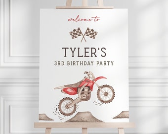 May include: Welcome to Tyler's 3rd Birthday Party sign with a red dirt bike jumping over a dirt mound. The sign features checkered flags and a watercolor style.