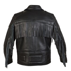 May include: Black leather jacket with fringe detailing on the shoulders and sleeves. The jacket has a quilted design and a zipper closure.