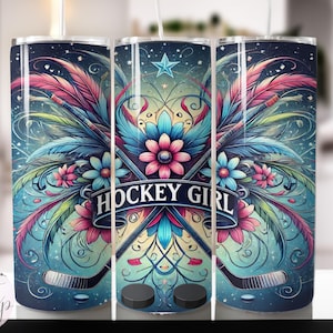 May include: A stainless steel tumbler with a colorful design featuring hockey sticks, feathers, and flowers. The text "Hockey Girl" is printed on the tumbler.