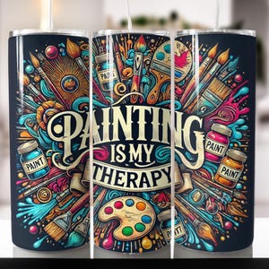 May include: Three stainless steel tumblers with a colorful design featuring paintbrushes, paint tubes, and the text "Painting is my therapy".