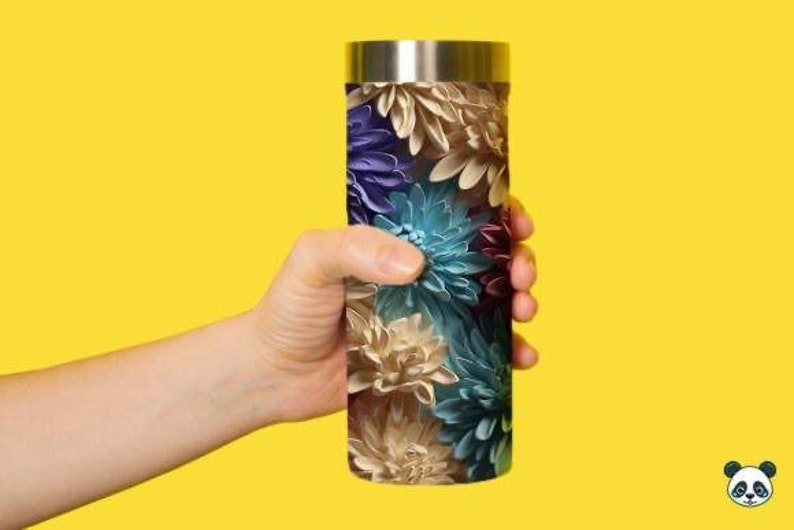 May include: A stainless steel travel mug with a floral pattern featuring shades of blue, purple, and brown.