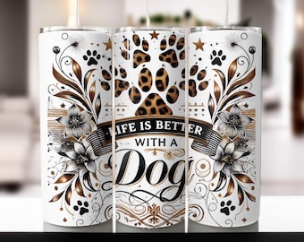 May include: White tumbler with a gold and black design featuring paw prints, flowers, and the text "Life is better with a Dog".
