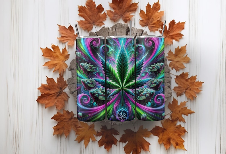 May include: Three stainless steel tumblers with a psychedelic design featuring a green marijuana leaf surrounded by swirling pink, blue, and green colors.