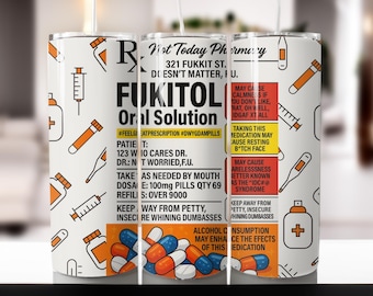 May include: A white tumbler with a humorous prescription label design. The label reads "Fukitol Oral Solution" with various warnings and instructions, and is decorated with medical-themed illustrations in orange and black.