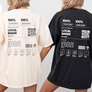 May include: Ivory and black Comfort Colors t-shirts with a graphic design. The design includes the text "100% Custom Treats, Melted Hearts" and "Local Baker @custom". The shirts have a QR code and ingredient list.