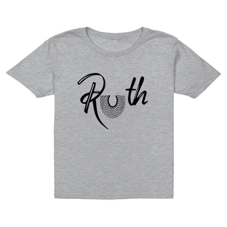 May include: A gray t-shirt with a black graphic of the name "Ruth" with a stylized black collar design.