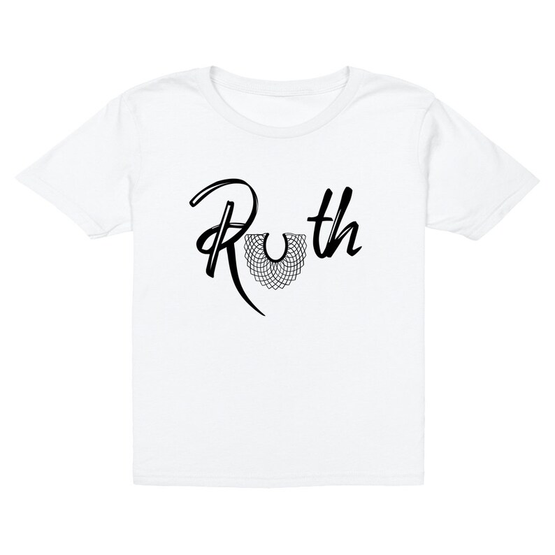 May include: White t-shirt with a black graphic of the name "Ruth" with a stylized black collar design.
