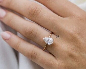 Pear Cut Sterling Silver Engagement Ring: White Diamond CZ Solitaire