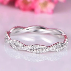 14K Gold CZ Twist Ring: Simulated Diamond Wedding Band