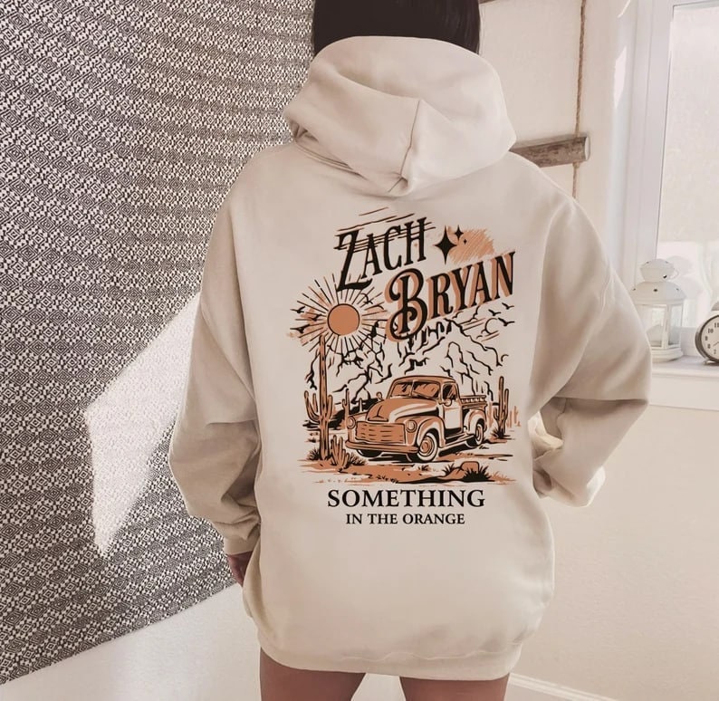 Discover Zach Bryan Something In The Orange Hoodie, American Heartbreak Hoodie