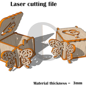 May include: Laser cutting file for a wooden box with a butterfly design. The box has a hinged lid and a heart-shaped cutout on the front. The material thickness is 3mm.