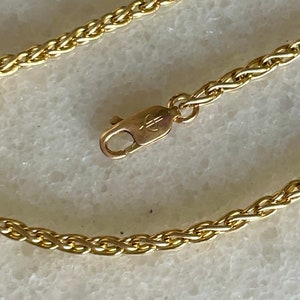 14k yellow gold woven rope bracelet 7 inches