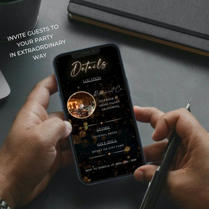 May include: A smartphone displays a party invitation with gold text on a black background. The invitation includes details such as location, attire, and RSVP information. The phone is held in a person's hands, with a pen in the other hand.