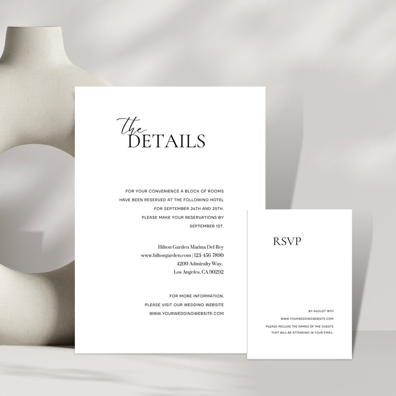 May include: A black and white wedding invitation with the text "The Details" and information about the wedding venue, date, and RSVP details.