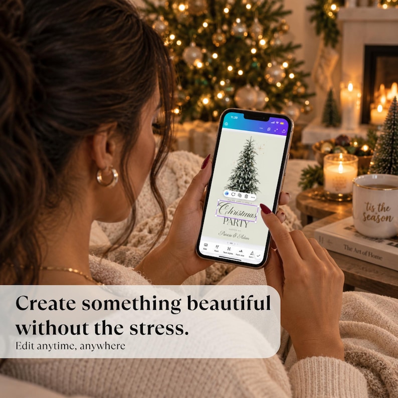 May include: A smartphone displaying a digital design interface with a Christmas tree graphic and the text Christmas PARTY. The screen shows editing tools and a cursor highlighting the text. The device is held in a neutral setting with soft lighting.