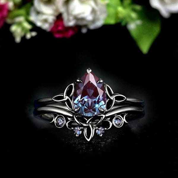 Set di anelli con nodo celtico in alessandrite a pera, fede nuziale in oro nero gotico