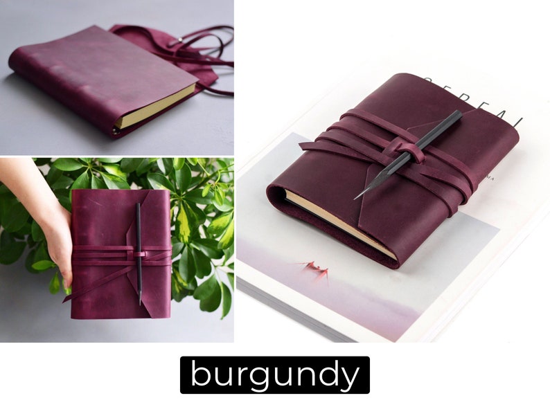 May include: Burgundy leather journal with a wrap-around closure and a pencil holder. The journal has a gold-colored edge and a matching burgundy strap. The word "burgundy" is displayed in a black rectangle at the bottom of the image.
