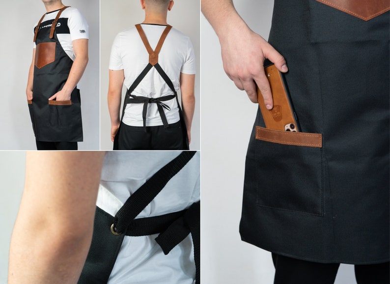 May include: Black canvas apron with brown leather accents and a large pocket on the front. The apron has adjustable straps and a phone pocket.