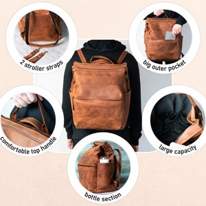 May include: A brown leather diaper bag backpack with multiple pockets and features. The backpack has a large outer pocket, a bottle section, a comfortable top handle, and a large capacity. It also includes two stroller straps.