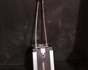 Replica of the bounty tracking device from Star Wars The Mandaloria