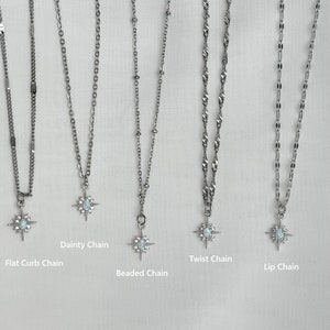 May include: Five silver chains with star-shaped pendants featuring a white opal stone. The chains are labelled "Flat Curb Chain", "Dainty Chain", "Beaded Chain", "Twist Chain", and "Lip Chain".