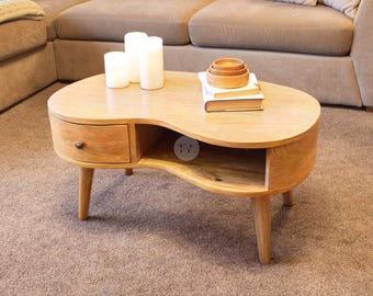 Wavy edge coffee table with oak finish, handmade using mango wood