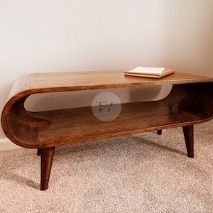 Lage salontafel Deens uit het midden van de eeuw • Scandinavische salontafel rond hout • Smalle salontafel Scandinavische stijl • Kleine salontafel donker hout