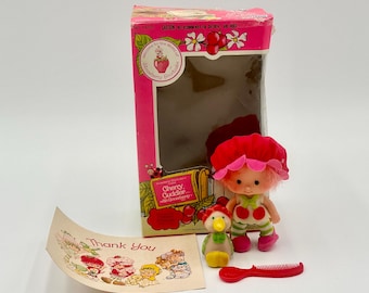 Muñeco Kenner Cherry Cuddler con grosella espinosa vintage de 1982 en caja abierta n.º 44220 (1.ª edición)