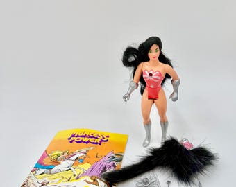 Figura de acción vintage de los años 80 de She-Ra, Princesa del Poder, villana Catra, con cómic.