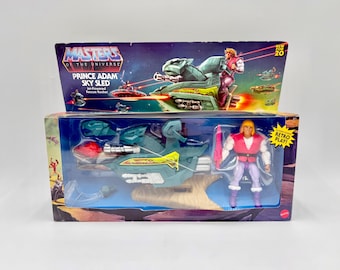 MOTU 2019 Modernized He-Man Retro Play Action Figure Prince Adam and his Sky Sled New in Packaging