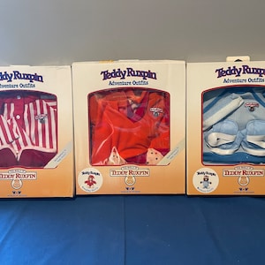 Vintage 1985 Worlds of Wonder Teddy Ruxpin 3 Adventure Outfits NIB