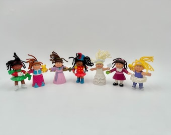 Lote de 7 figuras navideñas de McDonald's de Cabbage Patch, años 1992-94