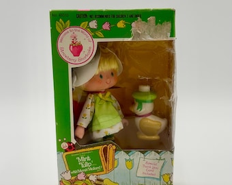 Tulipán menta estilo Strawberry Shortcake de Kenner, años 80, con mascota, ánade real de Marsh, IOB n.° 45010