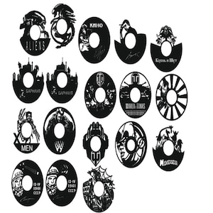 Può includere: Un set di 16 disegni circolari in bianco e nero con vari temi di cultura pop e cinema. I disegni includono personaggi di Alien, World of Tanks, X-Men e altro ancora. Ogni disegno ha un ritaglio circolare al centro.